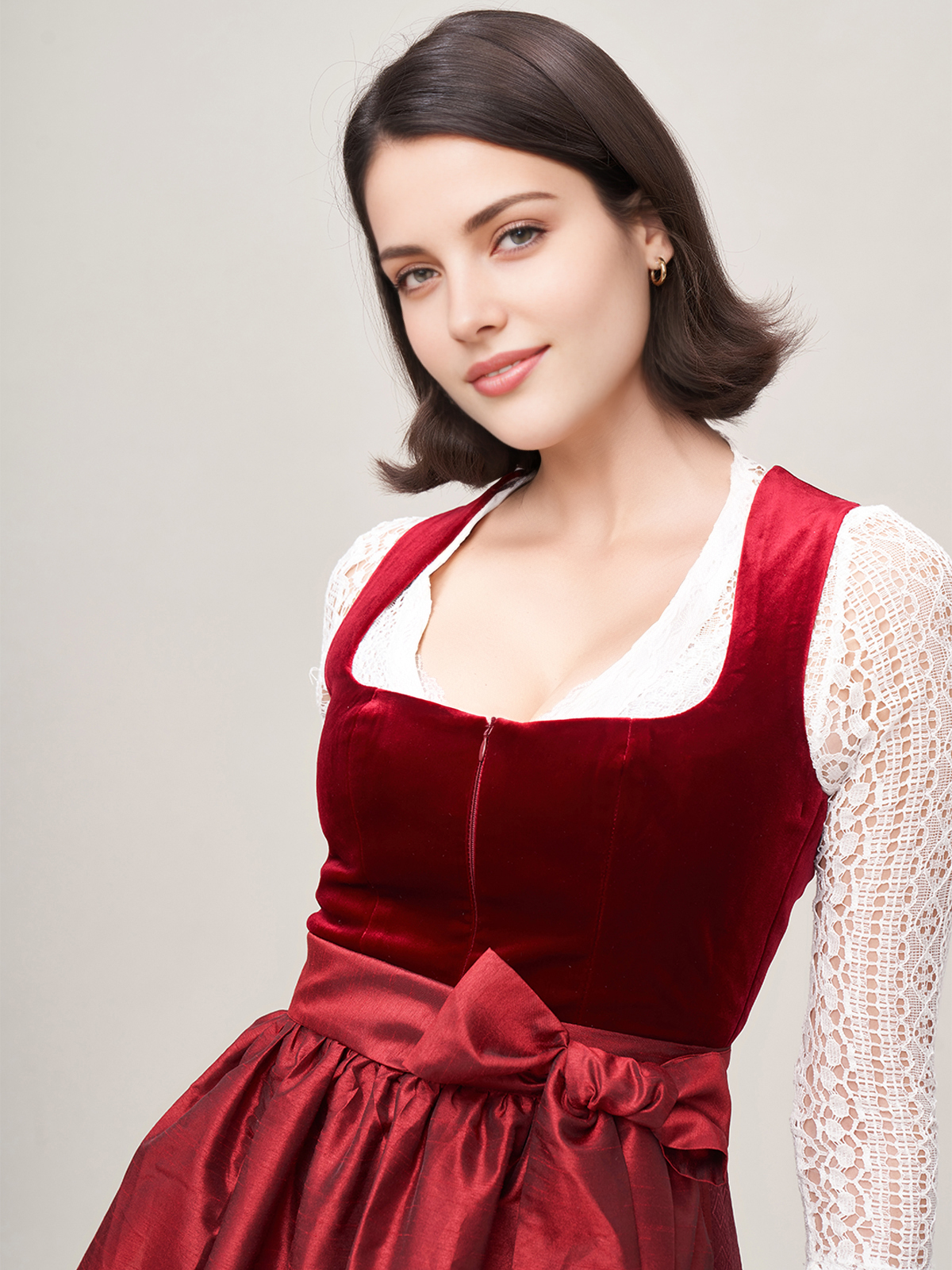 Modernes grünes Samt-Dirndl mit schmaler Taille und dezentem Dekolleté
